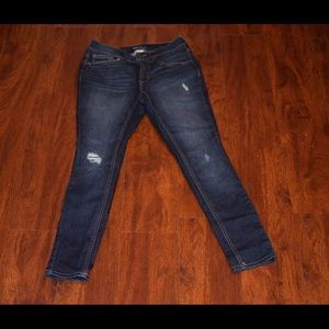 Size 8 dark wash skinny jeans. Reinforced rips